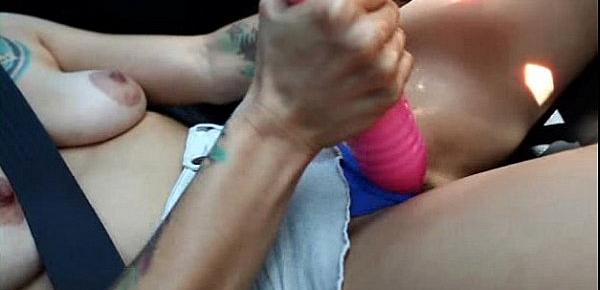  Belladonna masturbating while driving a car